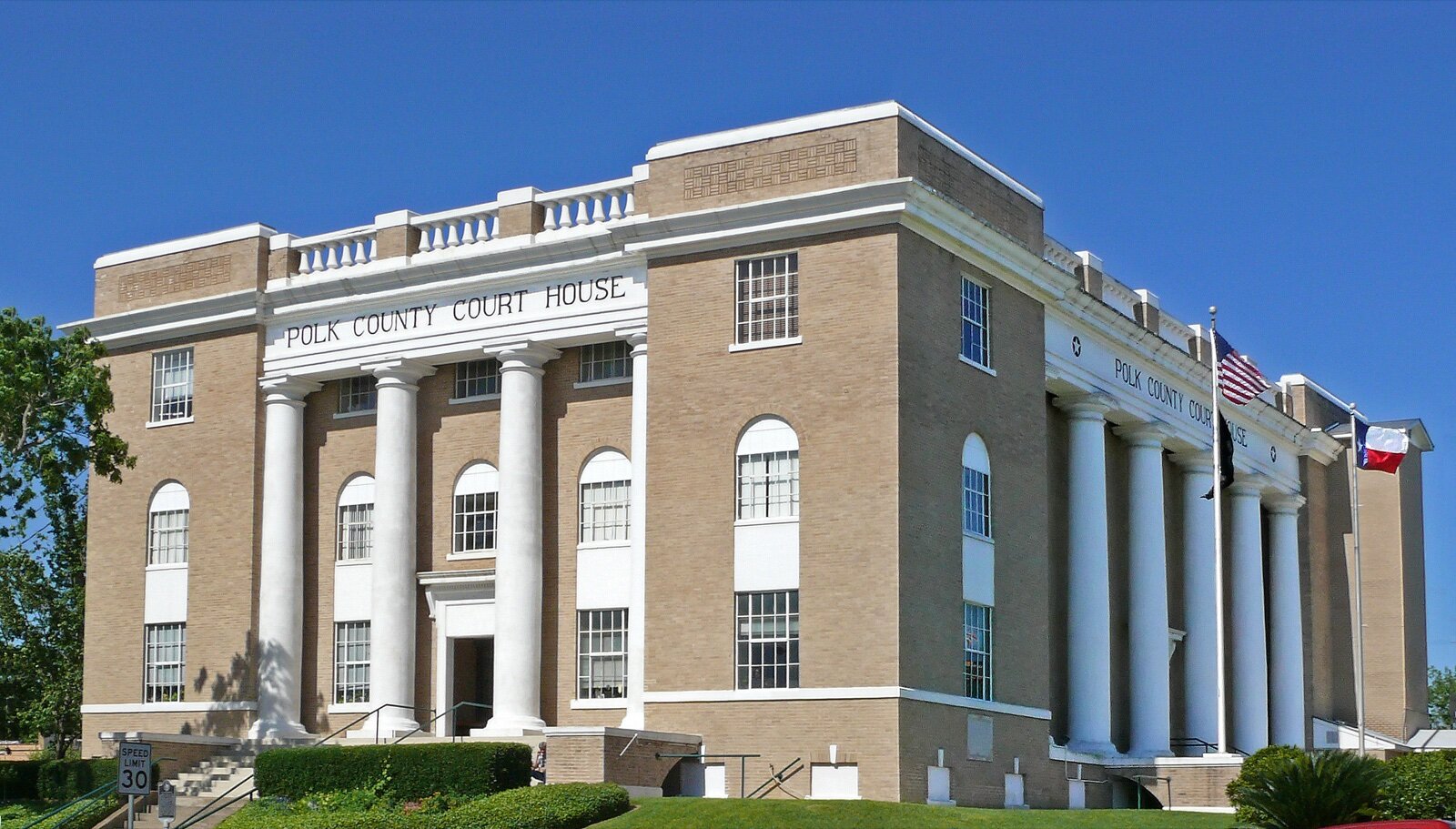 A columned courthouse building, illustrating regulation and enforcement